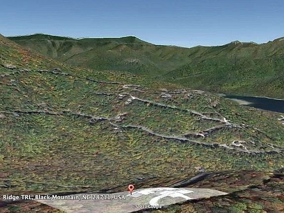 Google Earth View
						:
						Lot positioned at bottom, Blue Ridge Parkway near the tops of the peaks,