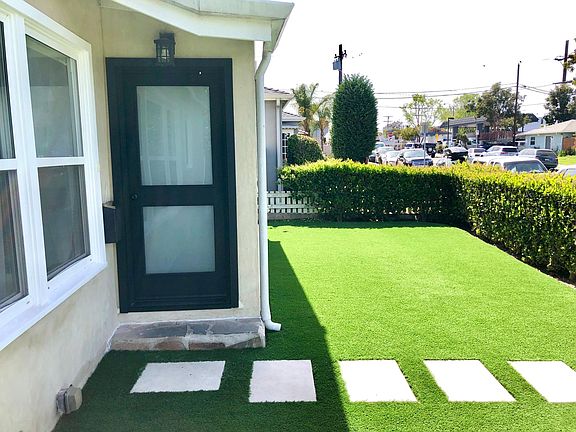 Front door and new waterless turf
