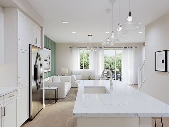 Kitchen leading into gathering area