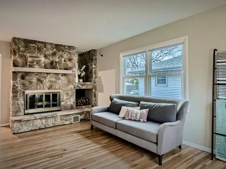Beautiful hardwood floors throughout with cozy fireplace