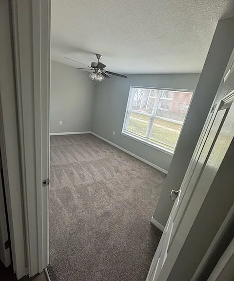 A LOT OF NATURAL LIGHT WITH CEILING FANS IN EVERY ROOM