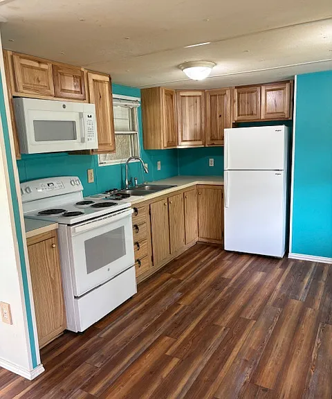 Remodeled kitchen new stove microwave and cabinets