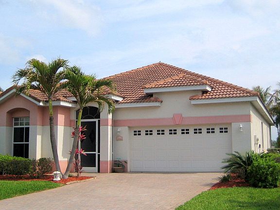Tile Roof with Paver Driveway