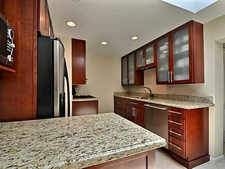 Kitchen with granite and stainless
