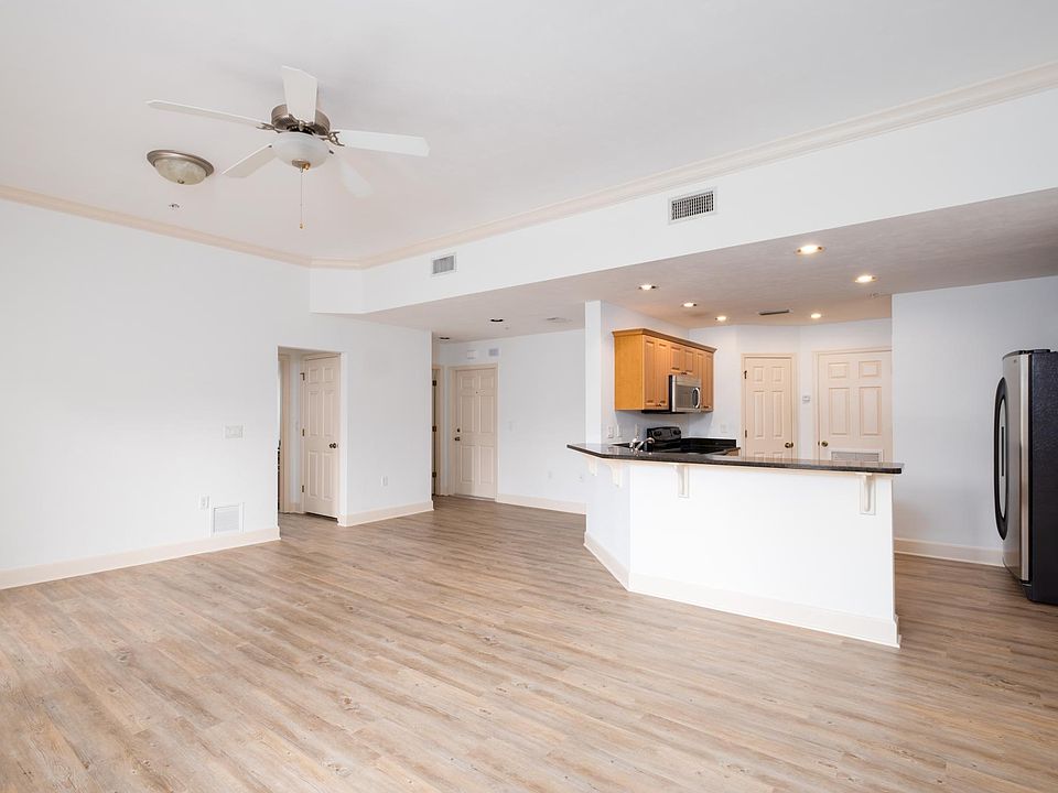Large and open concept. High ceilings with crown moldings.