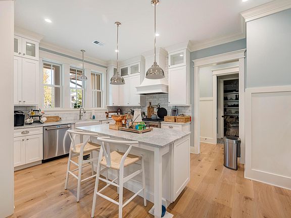 Kitchen with marble island.