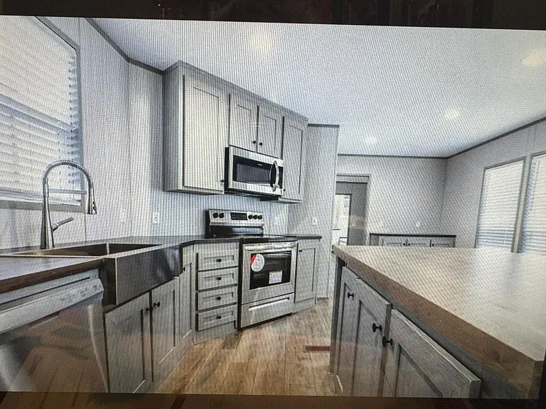 Open kitchen to dining and living, under island additional storage