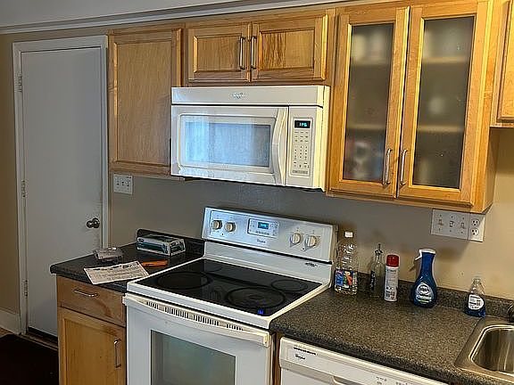 Kitch with door to garage 