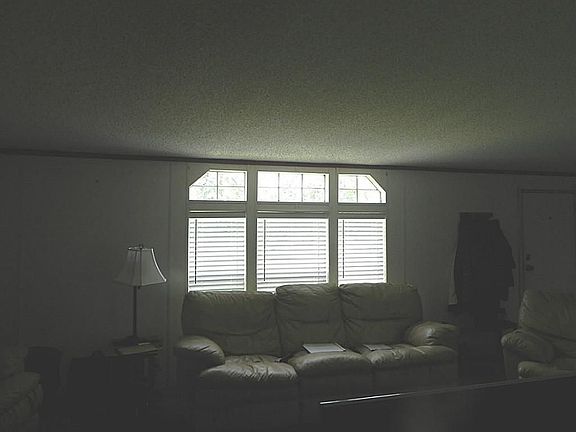 NICE WINDOWS IN LIVING ROOM WITH 2" BLINDS