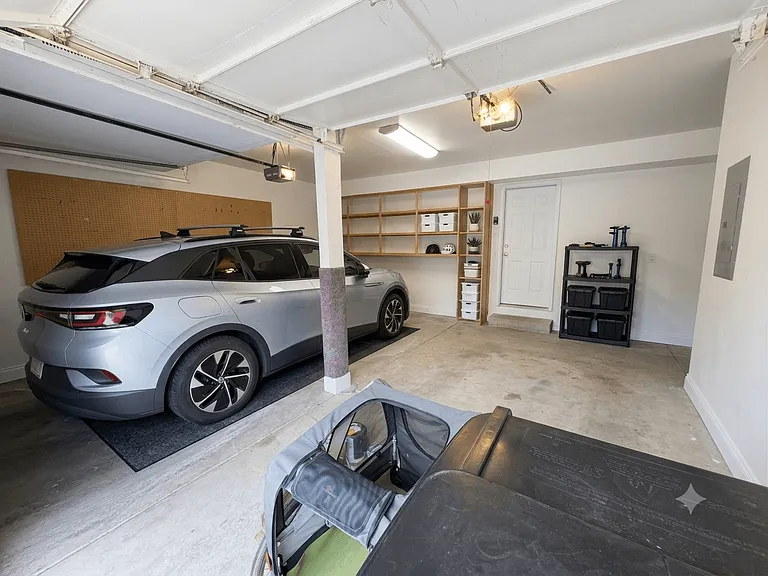 2 car garage with storage nook