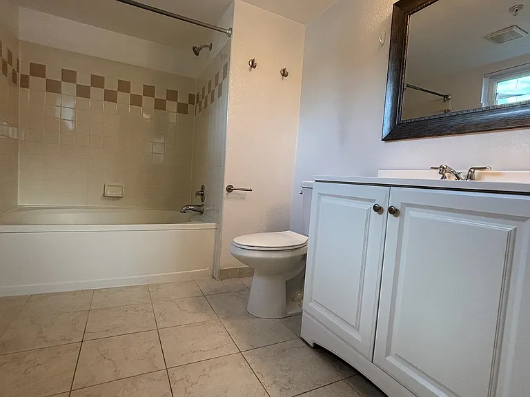 in-suite bathroom with soaker tub