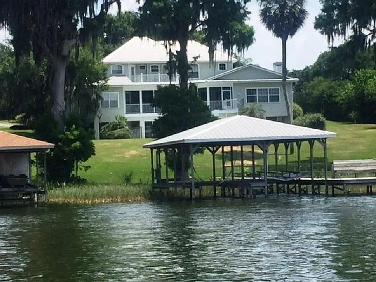 Looking back at the house and boat house from the lake