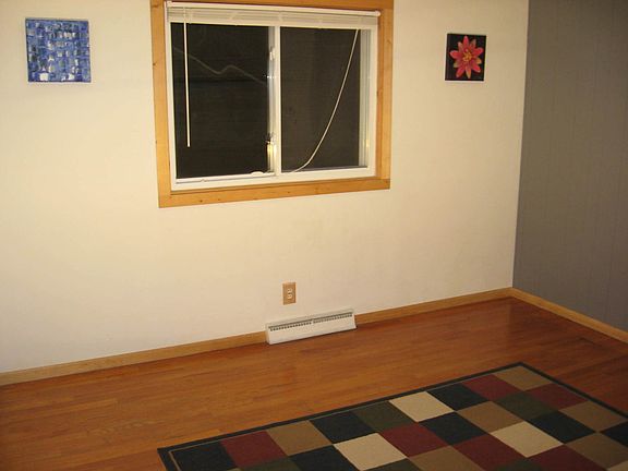 one of three bedrooms