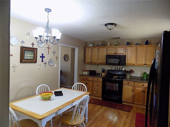 Nice size kitchen with updated cabinets and counter tops.
