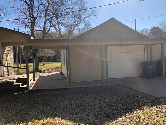 Detached oversized garage.