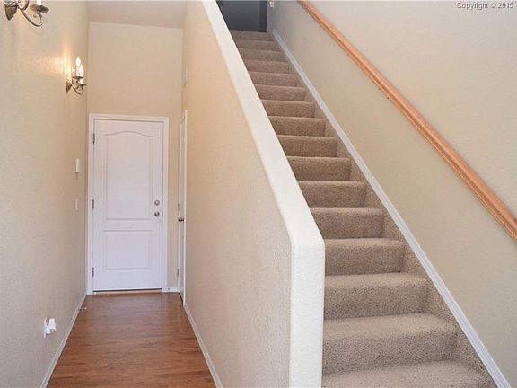 Garage entry and stairs to main level