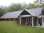 This nice earthberm home sits on a beautiful 120 acres m/l with a very nice mix