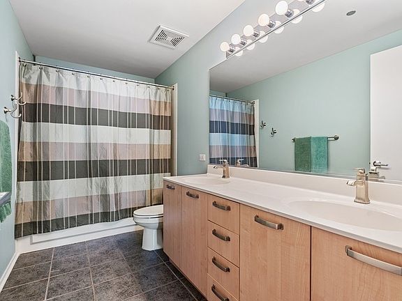 Large bathroom with double sinks