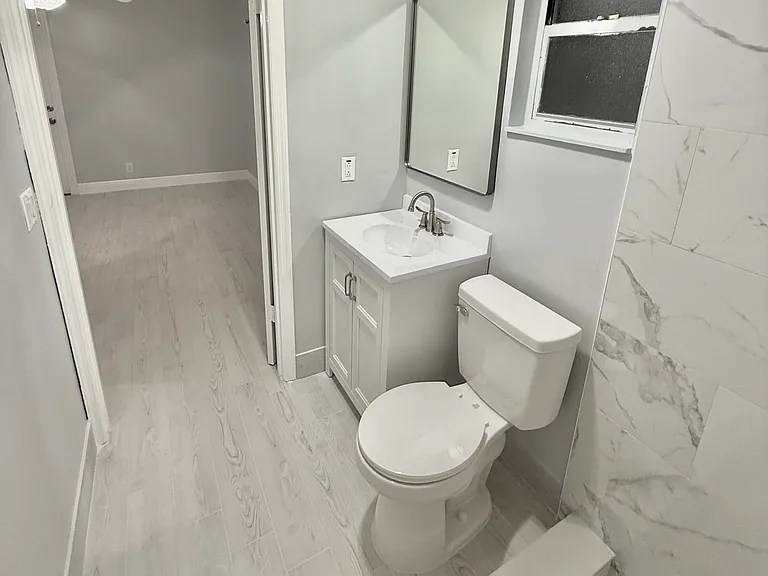 Second bathroom view into second bedroom