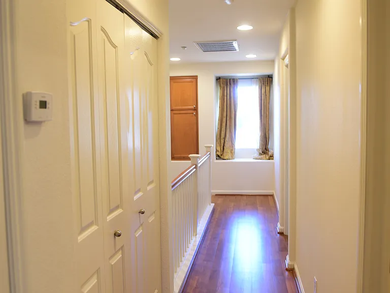 Upstairs hallway with laundry