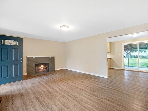 living room with the wood burning fire