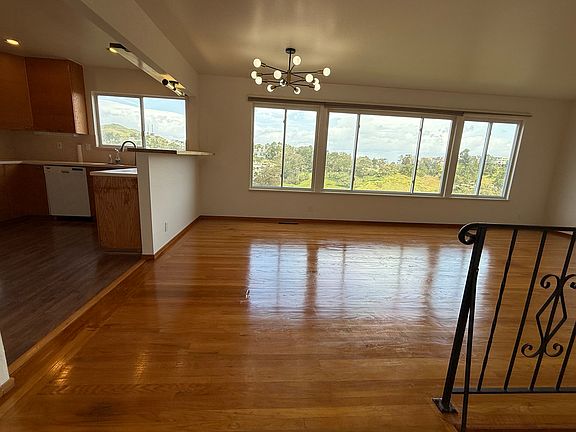 Kitchen-dining-living open concept. Bar height counter.