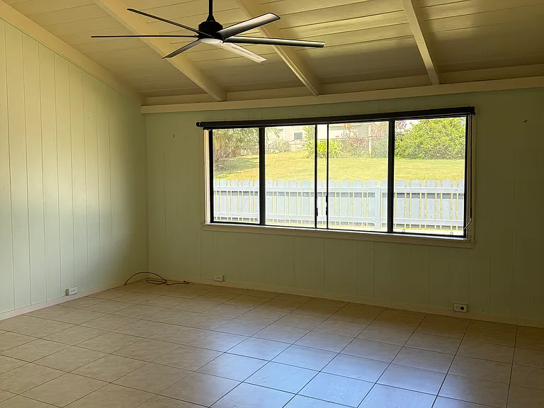 Living room with a view of the yard.