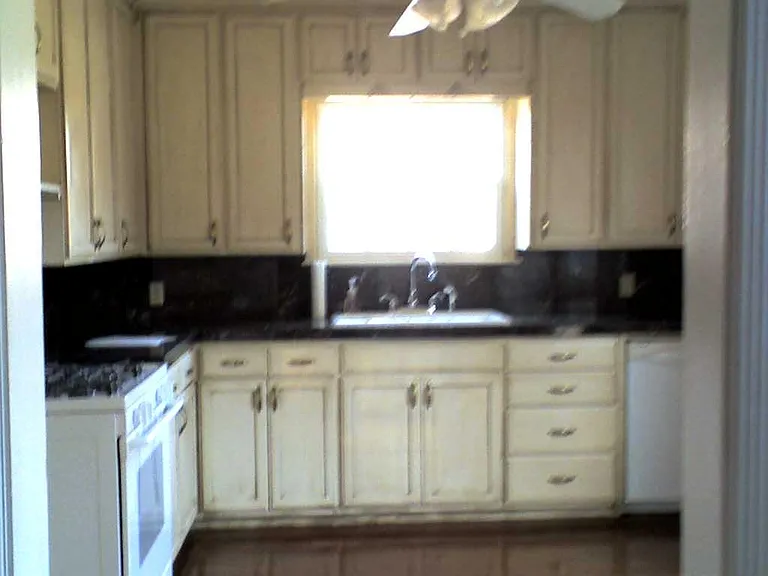 Kitchen cabinets are all white now.