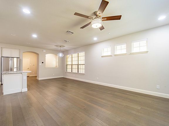 Open concept living with soaring ceilings and beautiful upgrades everywhere you look