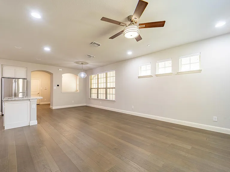 Open concept living with soaring ceilings and beautiful upgrades everywhere you look