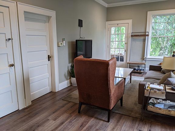 Master bedroom and basement accessed from the living room.