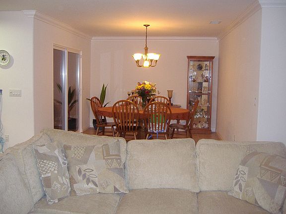 Dining room off living room with direct access to backyard