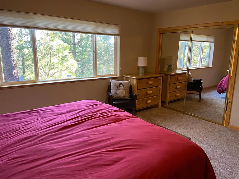 Master closet behind mirror doors