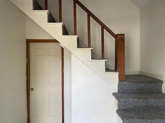 Foyer and Staircase to Upstairs Apartment