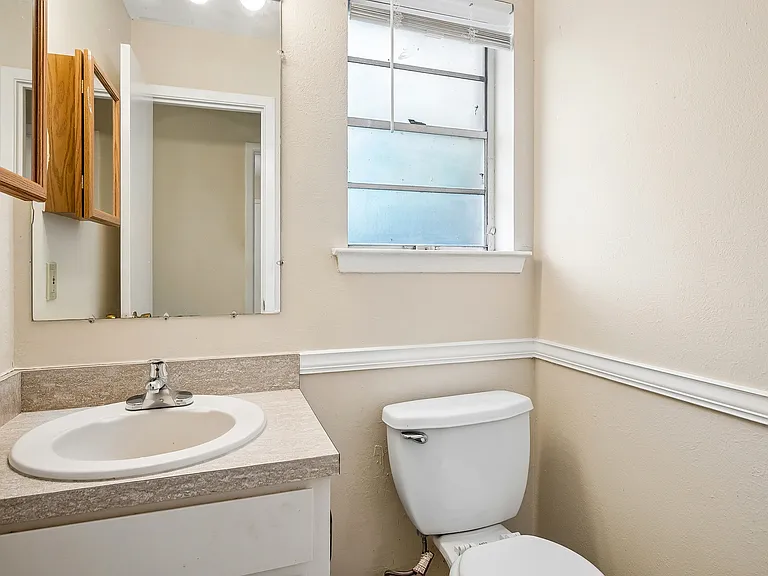 Powder bath across from the 4th bedroom.