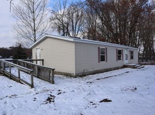 10050 S Maple Island Rd, Holton, MI 49425