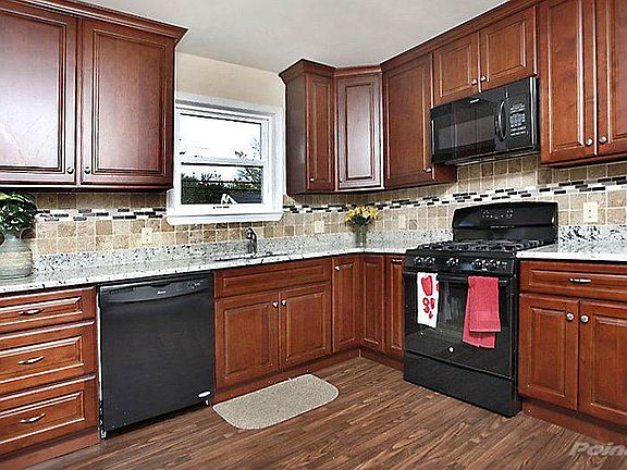 Cherry Kitchen with New Appliances