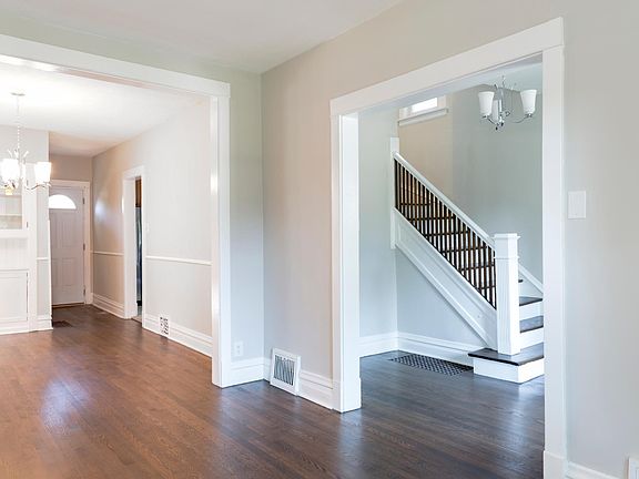 Dining room (on left) with custom built-in cabinets.