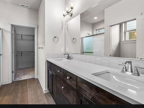Master bathroom. *Note: my home has the white cabinets (not brown as is shown in this photo)