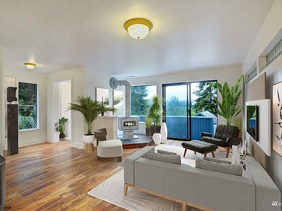 Virtual staging, but wood-burning fireplace is very real, as are the western views.>