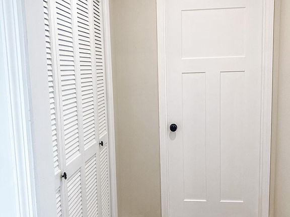 Laundry/pantry/back door to carport.