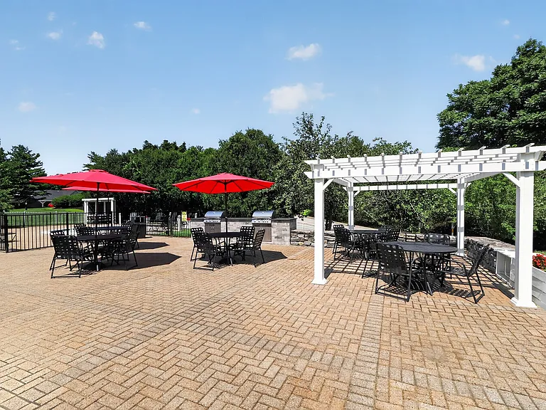 Unwind in the inviting outdoor space at Vista Point Apartments, featuring cozy seating and shaded areas perfect for relaxation or social gatherings. Embrace a lifestyle of comfort and conveniencesee it for yourself today!