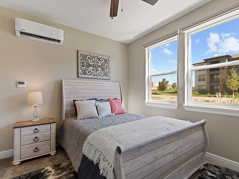 Light-filtering zebra shades on all windows and doors