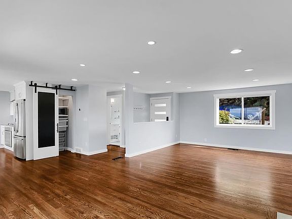 Front entrance, living area, and pantry