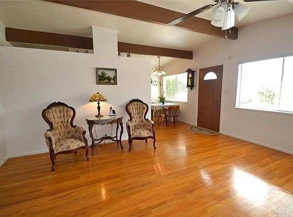 This home has distinctive beam ceiling throughout giving an open & airy feel