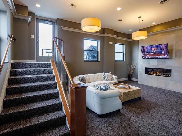 Rooftop Lounge with kitchenette and restroom. This area is used for additional entertainment space.