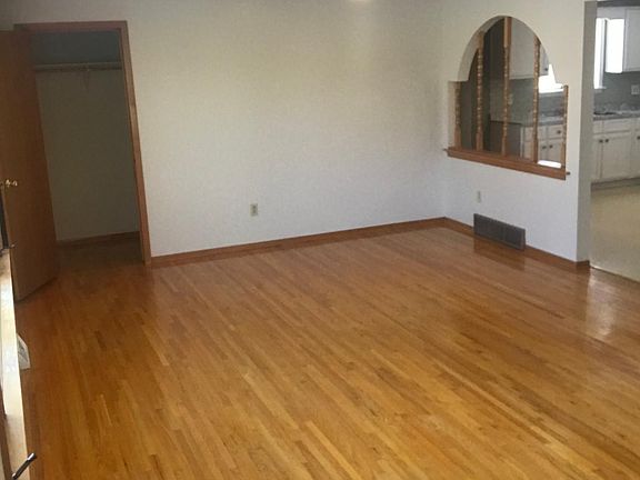 Living room with front closet