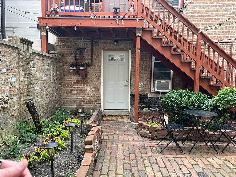 view of the apartment door from the courtyard