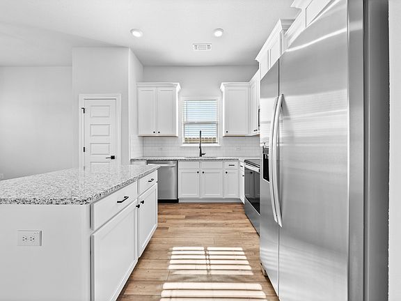 The kitchen has a convenient kitchen island.