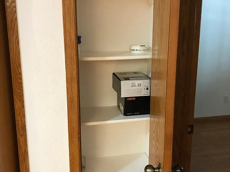 Storage adjacent to bathroom
